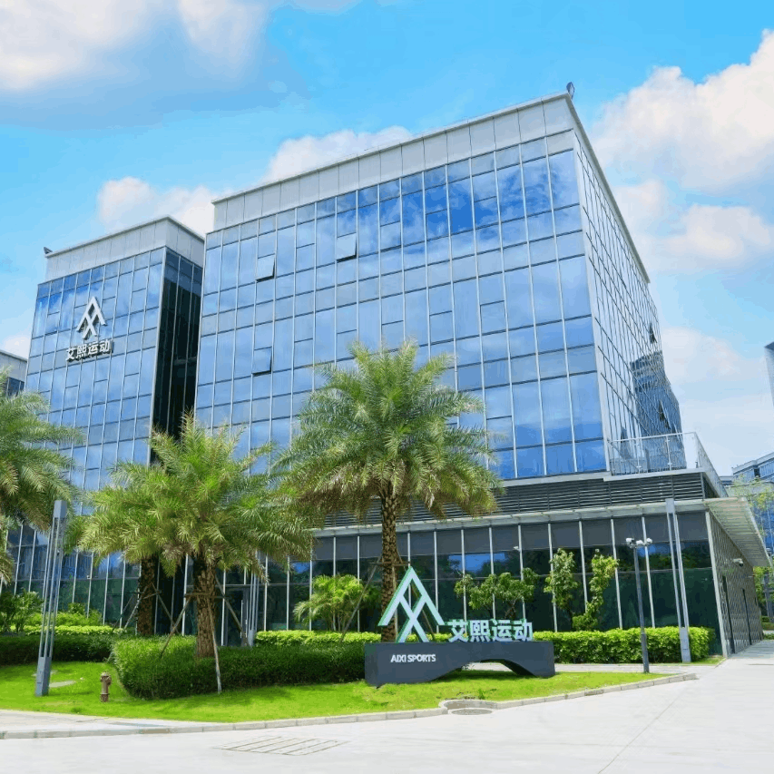 Aixi Sports factory building exterior with company signage showing 15-year stunt scooter manufacturing facility in Guangdong China